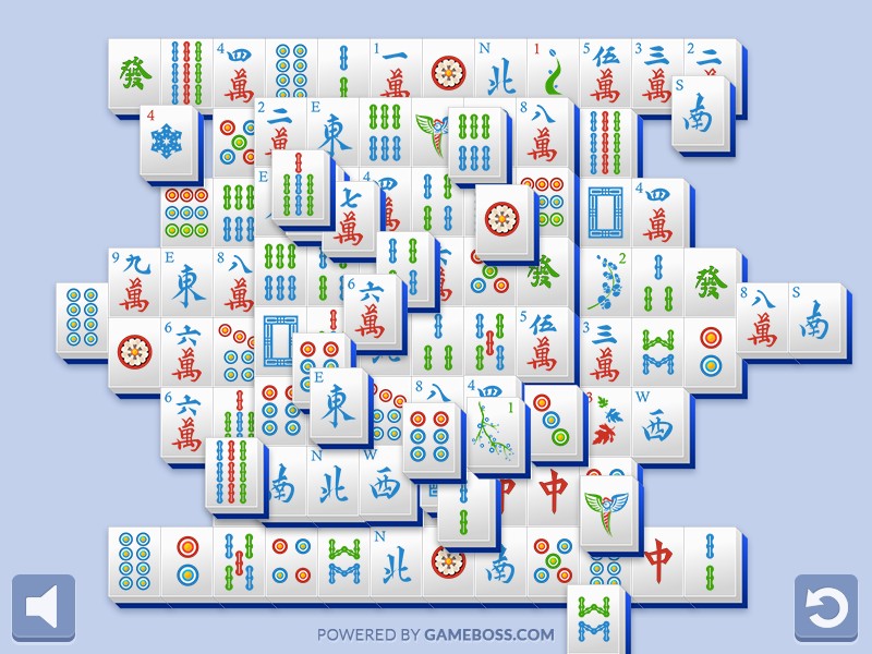 A vibrant Mahjong game board with colorful tiles and symbols