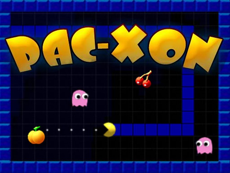 Pac Xon gameplay featuring a yellow character capturing ghosts